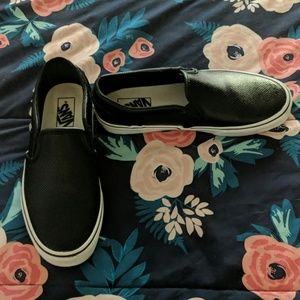 Black Vans slip ons